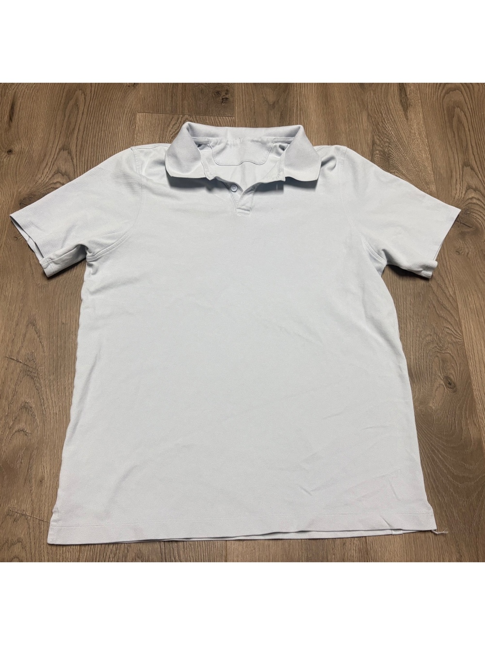 Light blue short sleeve polo shirt